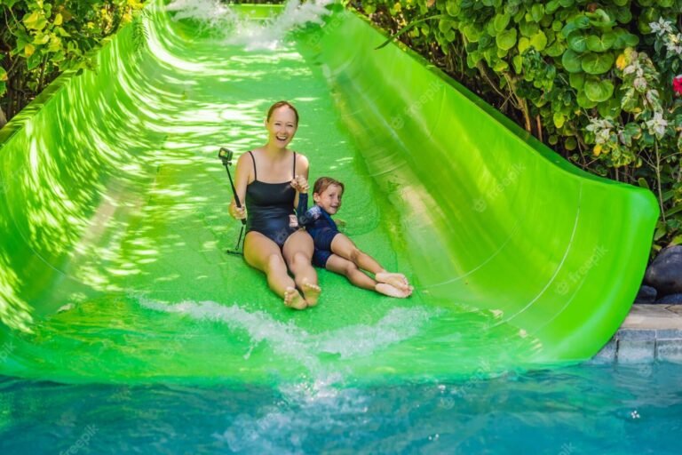 mom-son-have-fun-water-park_247622-27282